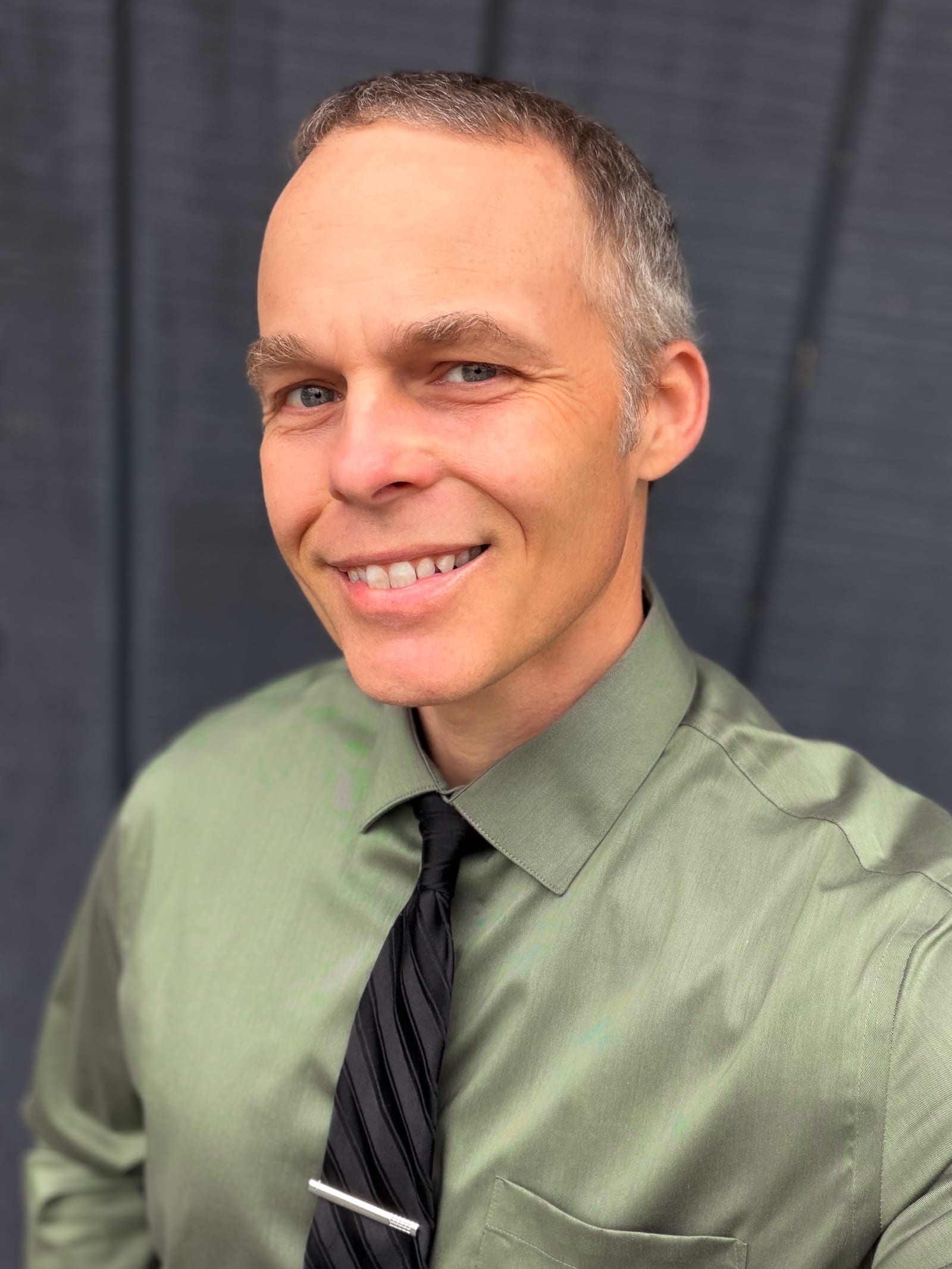 Aaron Riddle - Creative and Communications Director